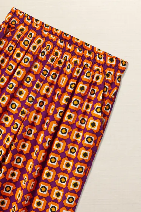 Twin set geométrico morado