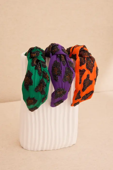 Diadema animal print resina