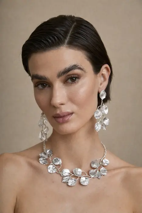 Pendiente rama metal labrado