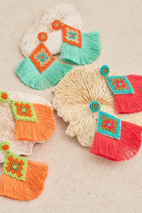 Pendiente abanico flecos