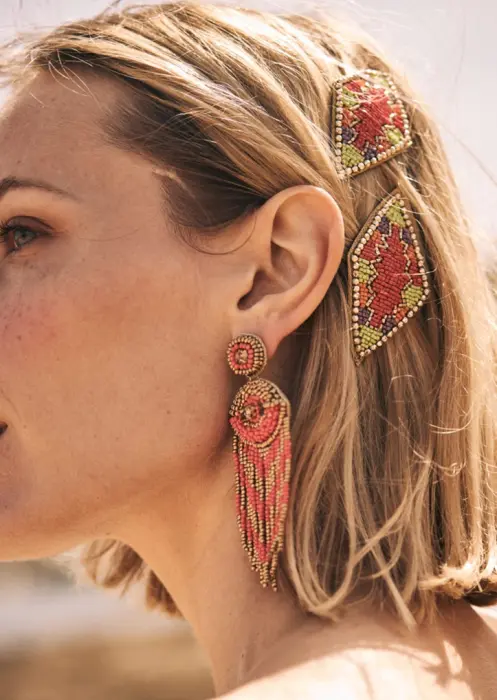 Pendiente óculo flecos