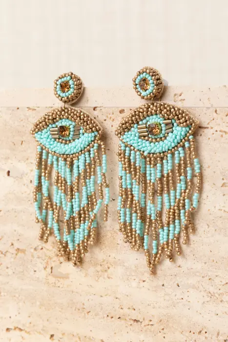 Pendiente óculo flecos