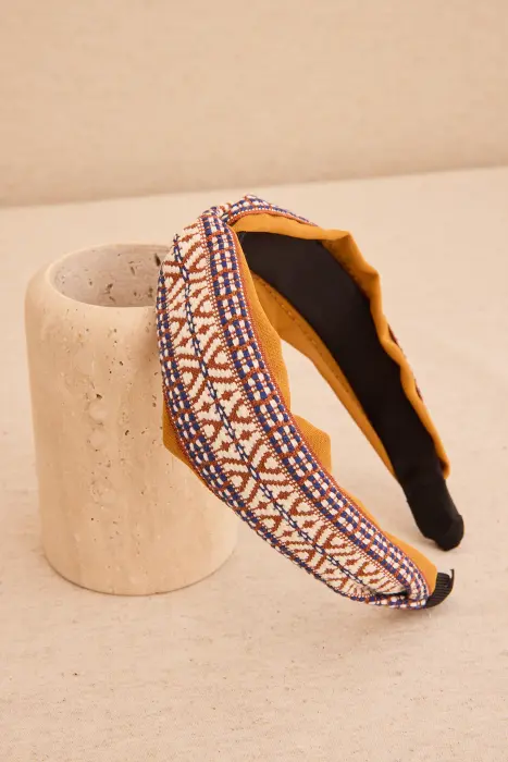 Diadema cinta satén nudo