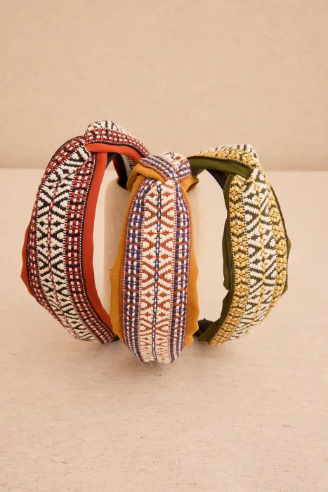 Diadema cinta satén nudo