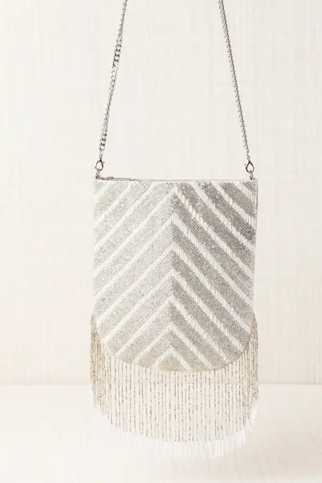 Bolso vestir flecos