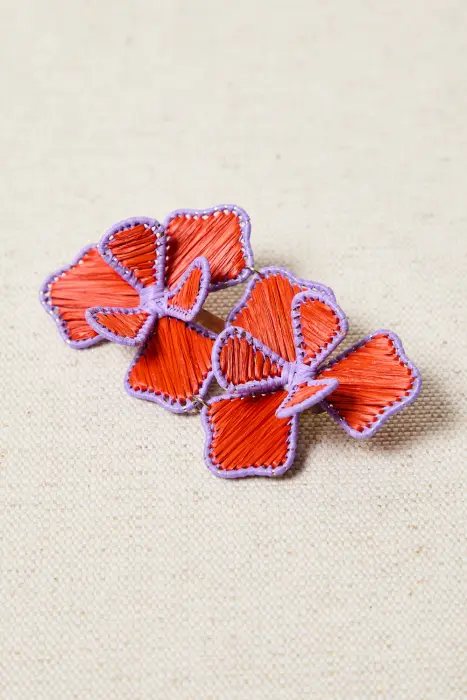 Broche doble flor rafia