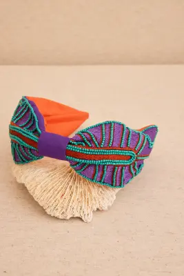 Diadema bordada resina dorada