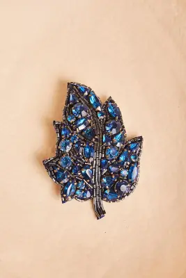 Broche hoja cristales